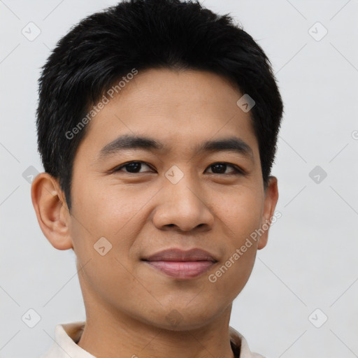 Joyful asian young-adult male with short  black hair and brown eyes