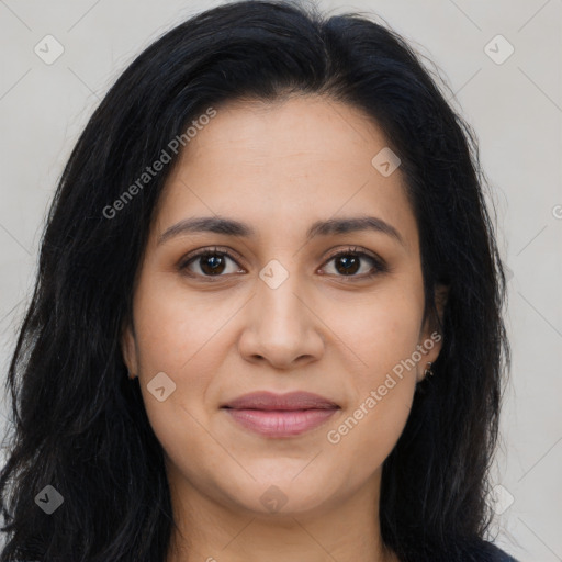 Joyful latino young-adult female with long  brown hair and brown eyes