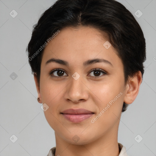 Joyful latino young-adult female with short  brown hair and brown eyes