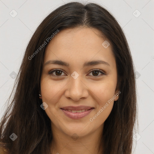 Joyful latino young-adult female with long  brown hair and brown eyes