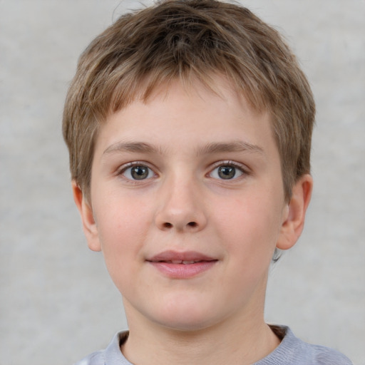 Joyful white child male with short  brown hair and grey eyes