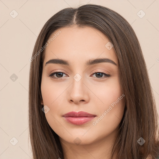 Neutral white young-adult female with long  brown hair and brown eyes