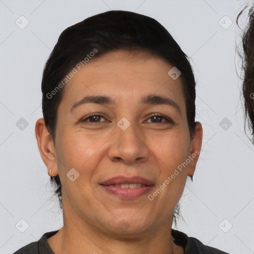 Joyful white adult female with short  brown hair and brown eyes