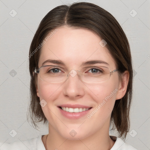 Joyful white young-adult female with medium  brown hair and grey eyes