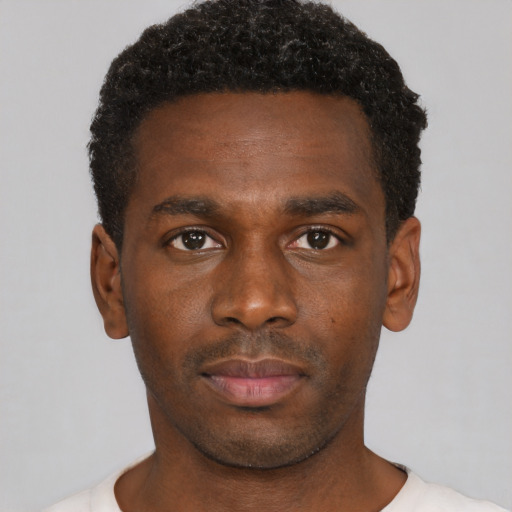 Neutral black young-adult male with short  brown hair and brown eyes