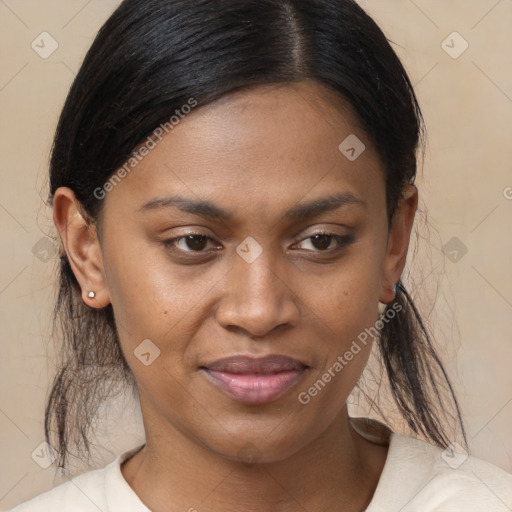 Joyful black young-adult female with medium  brown hair and brown eyes