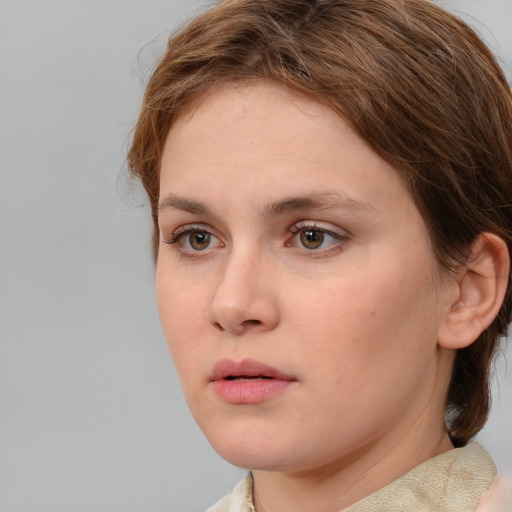 Neutral white young-adult female with medium  brown hair and brown eyes