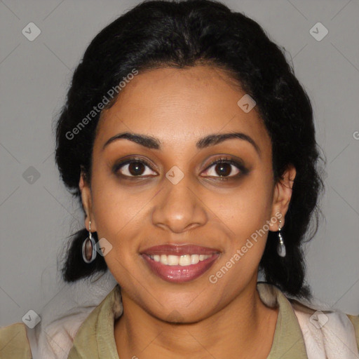 Joyful black young-adult female with long  black hair and brown eyes