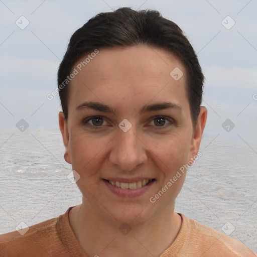 Joyful white young-adult female with short  brown hair and brown eyes