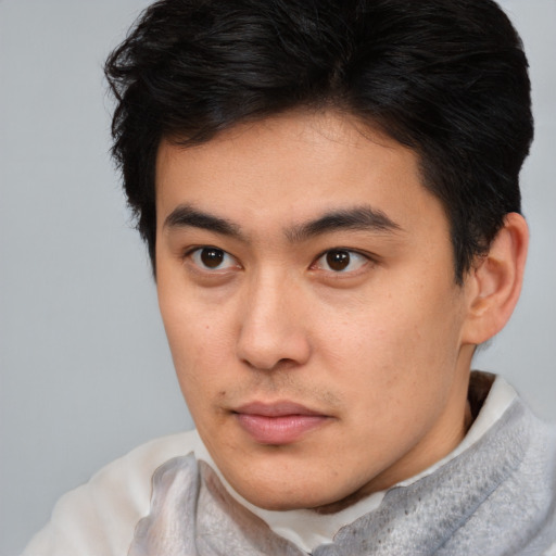 Neutral asian young-adult male with short  brown hair and brown eyes