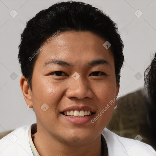 Joyful asian young-adult male with short  brown hair and brown eyes