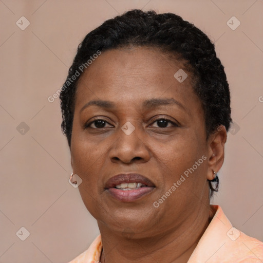 Joyful latino adult female with short  brown hair and brown eyes