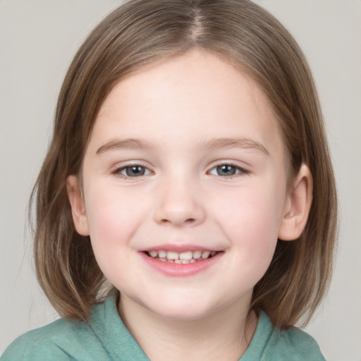 Joyful white child female with medium  brown hair and grey eyes