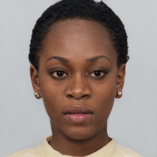Neutral black young-adult female with short  black hair and brown eyes