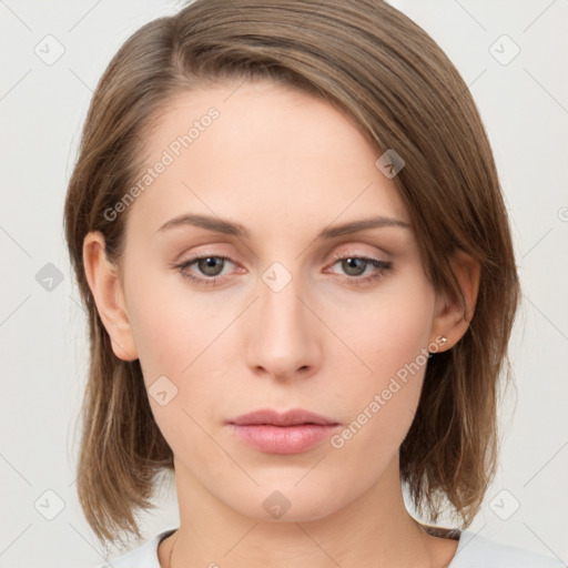 Neutral white young-adult female with medium  brown hair and grey eyes