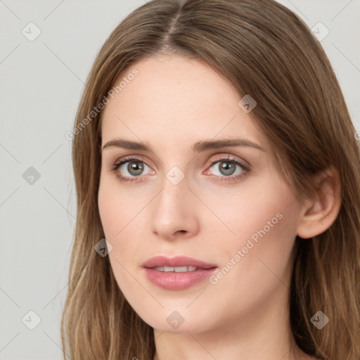 Neutral white young-adult female with long  brown hair and green eyes