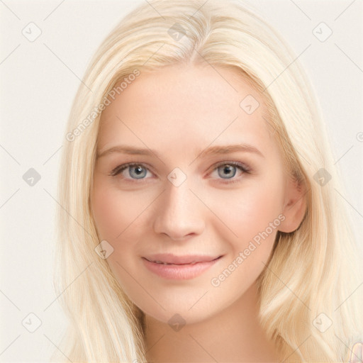 Joyful white young-adult female with long  brown hair and blue eyes