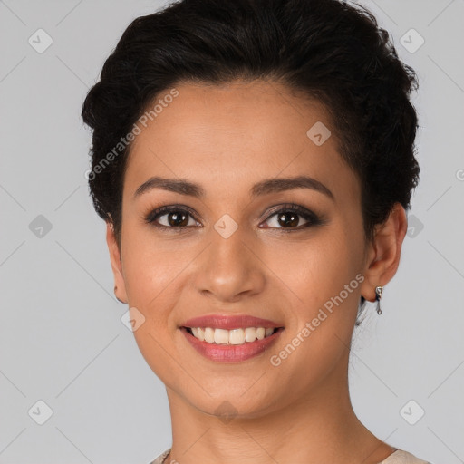 Joyful white young-adult female with short  black hair and brown eyes