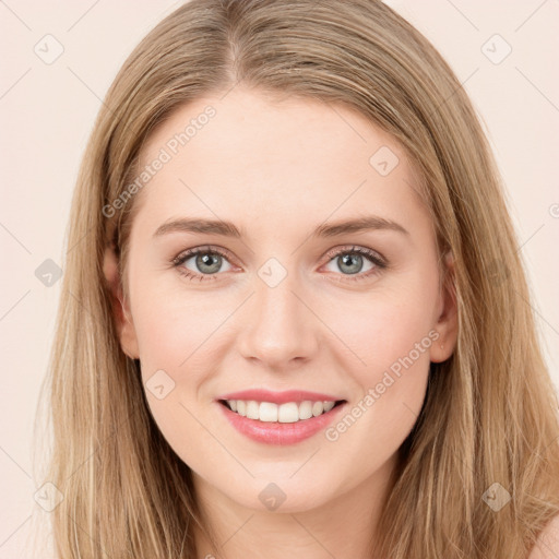 Joyful white young-adult female with long  brown hair and blue eyes