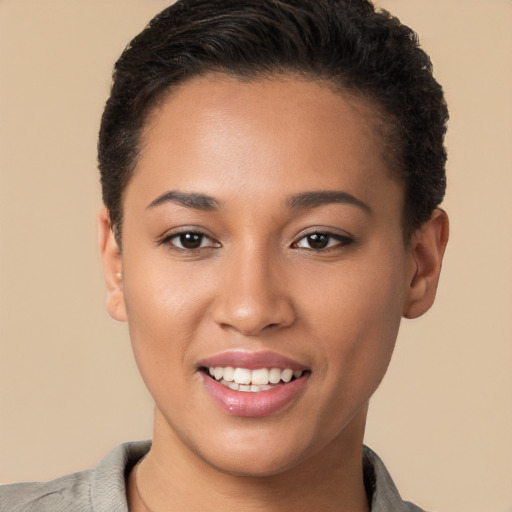 Joyful latino young-adult female with short  brown hair and brown eyes