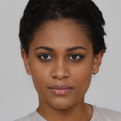 Neutral black young-adult female with short  brown hair and brown eyes