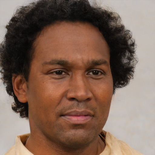 Neutral latino adult male with short  brown hair and brown eyes