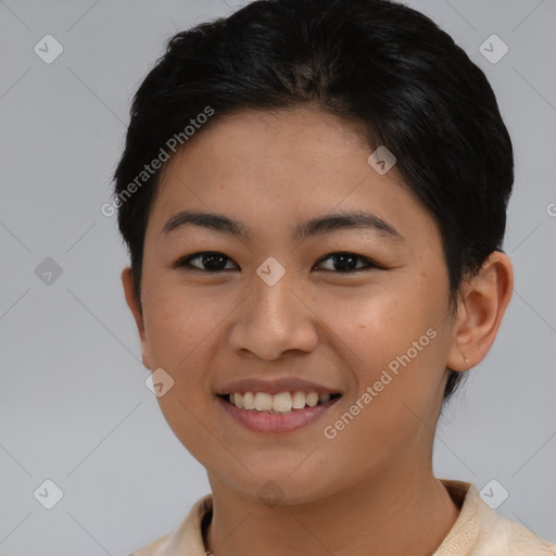 Joyful asian young-adult female with short  brown hair and brown eyes