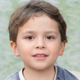 Joyful white child male with short  brown hair and brown eyes