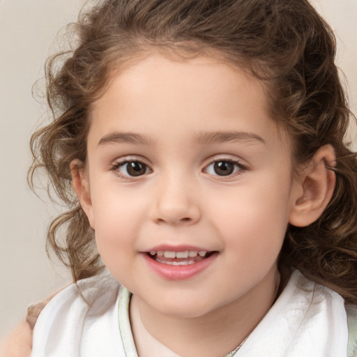 Joyful white child female with medium  brown hair and brown eyes