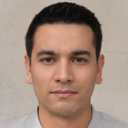 Neutral white young-adult male with short  black hair and brown eyes