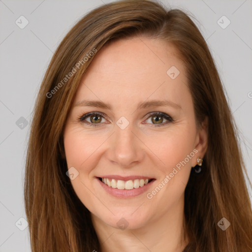 Joyful white young-adult female with long  brown hair and green eyes