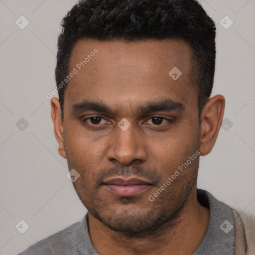 Neutral latino young-adult male with short  black hair and brown eyes