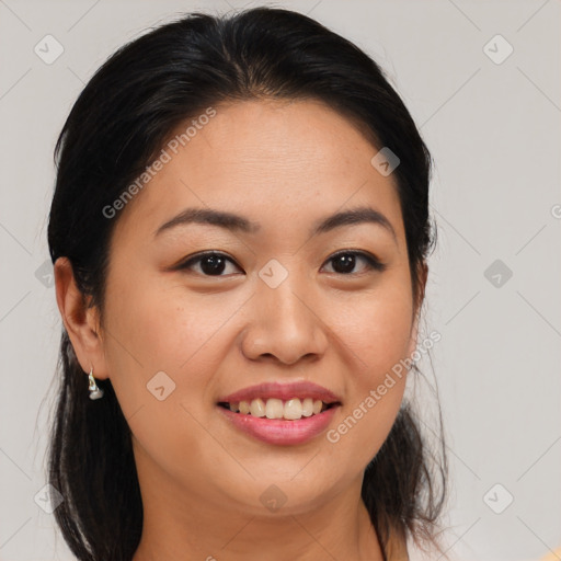 Joyful asian young-adult female with medium  brown hair and brown eyes