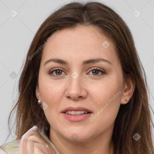 Joyful white young-adult female with long  brown hair and brown eyes