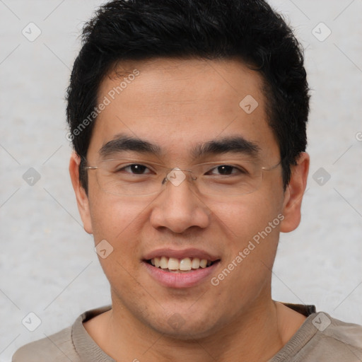 Joyful latino young-adult male with short  brown hair and brown eyes