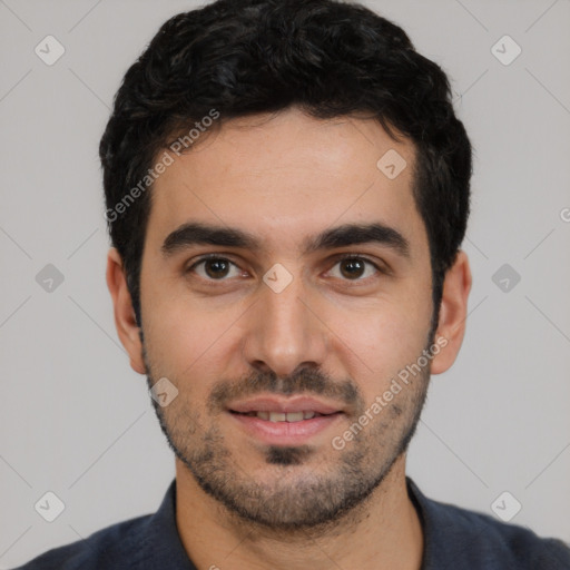 Joyful white young-adult male with short  black hair and brown eyes