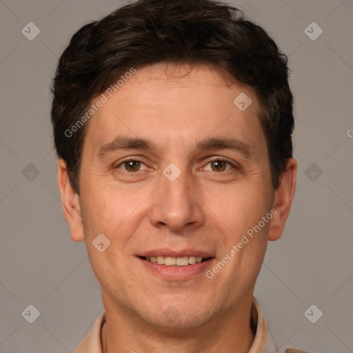 Joyful white adult male with short  brown hair and brown eyes