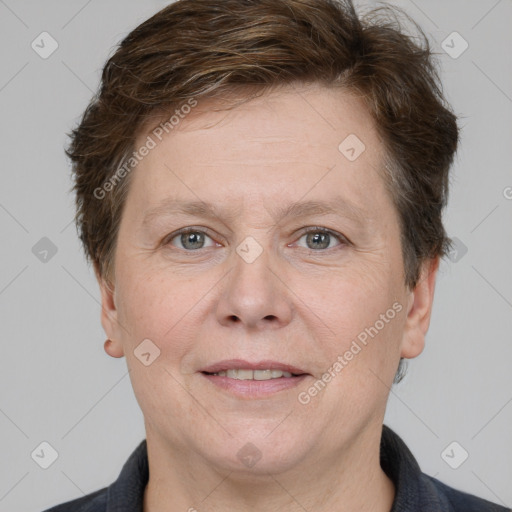 Joyful white adult female with short  brown hair and brown eyes