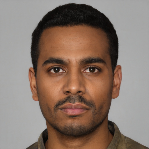 Neutral black young-adult male with short  black hair and brown eyes