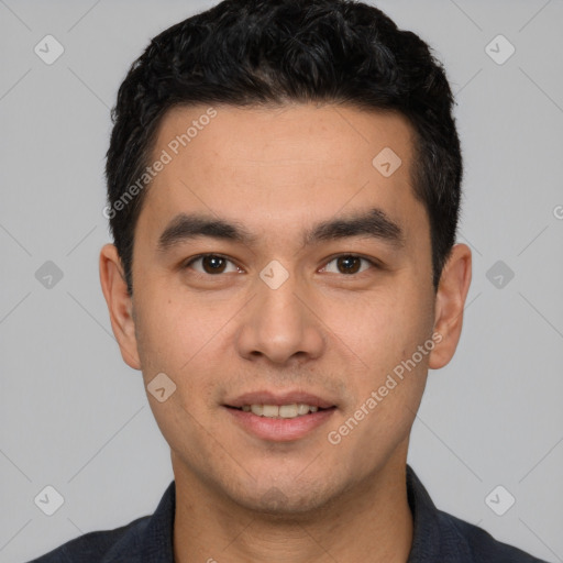 Joyful white young-adult male with short  black hair and brown eyes