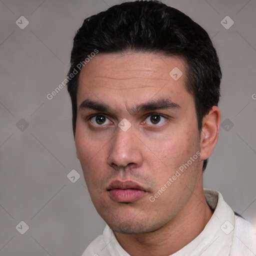 Neutral white young-adult male with short  black hair and brown eyes