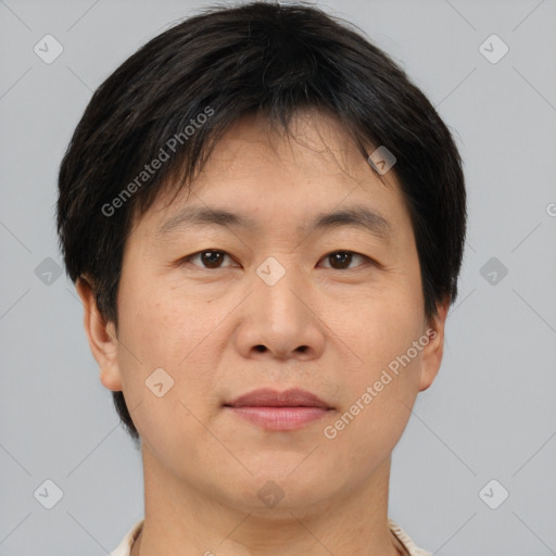 Neutral asian young-adult male with short  brown hair and brown eyes