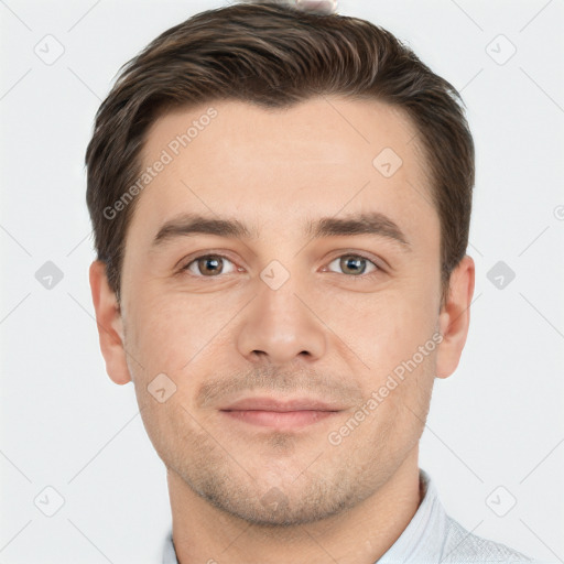 Joyful white young-adult male with short  brown hair and brown eyes