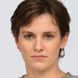 Neutral white young-adult female with short  brown hair and grey eyes