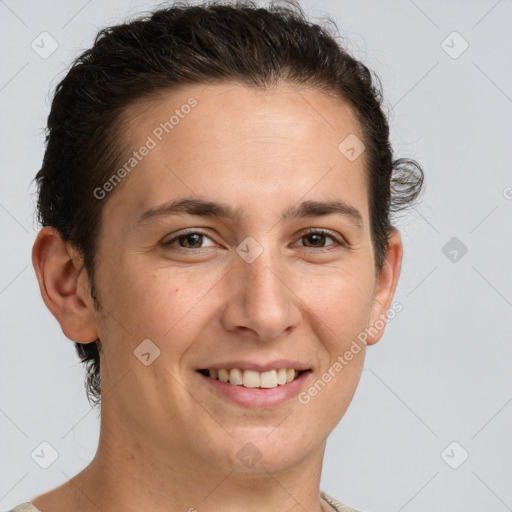 Joyful white adult female with short  brown hair and brown eyes