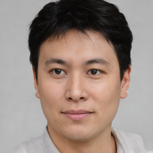 Neutral asian young-adult male with short  black hair and brown eyes