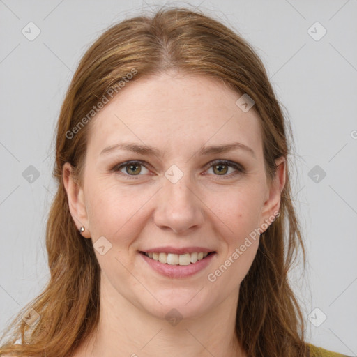 Joyful white young-adult female with long  brown hair and grey eyes