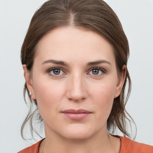 Neutral white young-adult female with medium  brown hair and grey eyes