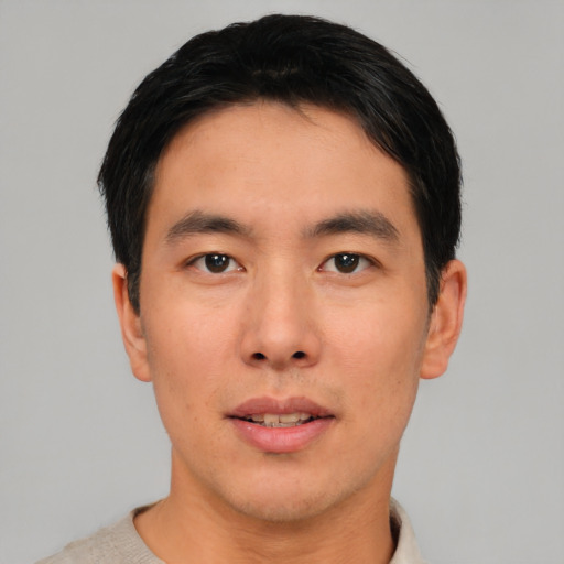 Neutral asian young-adult male with short  black hair and brown eyes