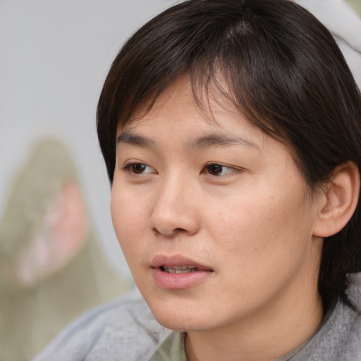 Neutral white young-adult female with medium  brown hair and brown eyes